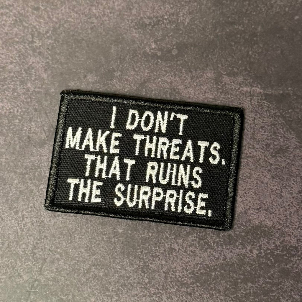 I Don't Make Threats, That Ruins The Surprise Morale Patch | Made in USA | VELCRO® Brand Hook Backing