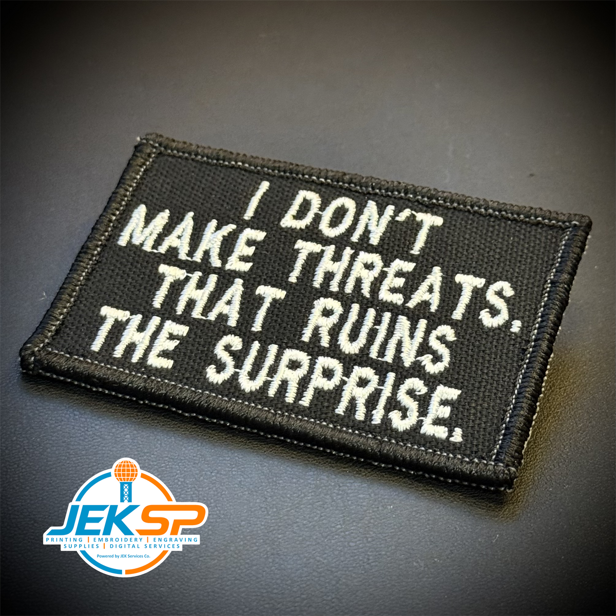 I Don't Make Threats, That Ruins The Surprise Morale Patch | Made in USA | VELCRO® Brand Hook Backing